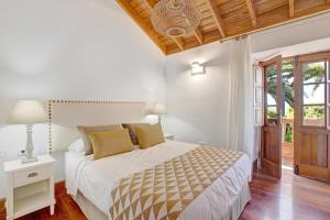 Postel nebo postele na pokoji v ubytování Casa Rural Dragomar