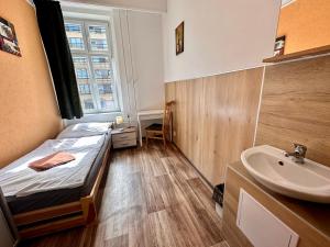 Postel nebo postele na pokoji v ubytování Pension SKLEP