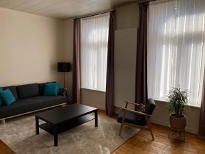 Posezení v ubytování Les Charmes d'Ostende