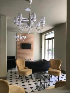 Μια τηλεόραση ή/και κέντρο ψυχαγωγίας στο Residence Paradiso Bilocale 103