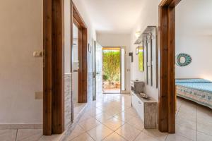 Posteľ alebo postele v izbe v ubytovaní Appartamento in Villa Gelsomino