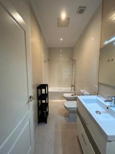 Koupelna v ubytování Olavide Premium Apartments