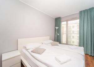 Posteľ alebo postele v izbe v ubytovaní Apartments Jaglana with Parking & SPA