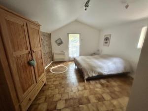 Llit o llits en una habitació de Chambre en bordure d'Aveyron