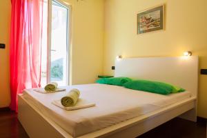 Posteľ alebo postele v izbe v ubytovaní Apartments Tino