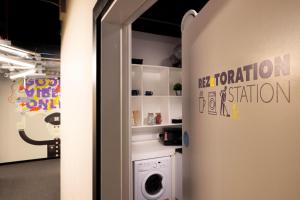 a laundry room with a washer and dryer at REZz Dublin in Dublin