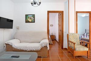 Televízia a/alebo spoločenská miestnosť v ubytovaní Casa Antonia 2