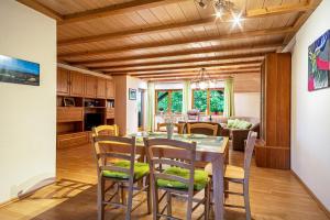 a kitchen and dining room with a table and chairs at Urlaub auf dem Hirschhof Stehle in Waldburg
