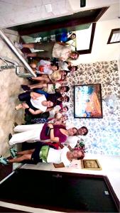 a group of people standing in a room at Swaran hotel in Amritsar +15 photos