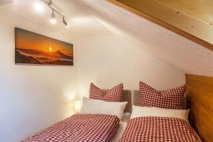 Postel nebo postele na pokoji v ubytování Ferienwohnung Reschberg