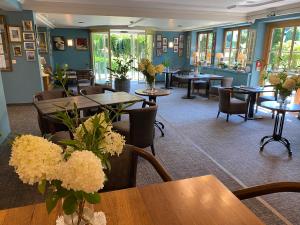 Um restaurante ou outro lugar para comer em Hotel Edelweiss Kitzbühel
