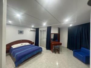 Postel nebo postele na pokoji v ubytování Residence ElFaracha
