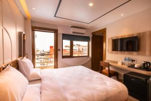 Voodi või voodid majutusasutuse Ananta Home toas