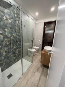 a bathroom with a shower and a toilet and a sink at Ca San Vito Lo Capo Villa Maria in San Vito lo Capo