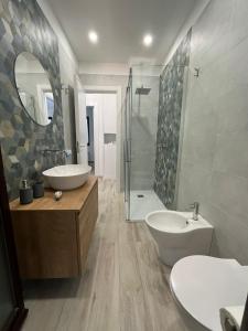 a bathroom with a tub and a sink and a shower at Ca San Vito Lo Capo Villa Maria in San Vito lo Capo