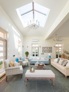 Khu vực ghế ngồi tại LohonoStays Colina Villa H