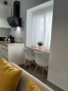 Kuchyň nebo kuchyňský kout v ubytování Apartamento 29