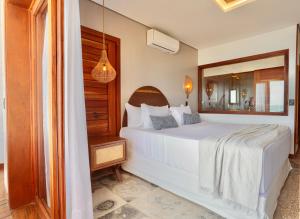 Postel nebo postele na pokoji v ubytování Carlore Hotel Taíba