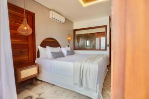 Postel nebo postele na pokoji v ubytování Carlore Hotel Taíba