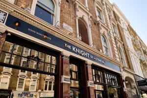 a building with a sign for the kantight on it at THE KNIGHT OF NOTTINGHILL in London