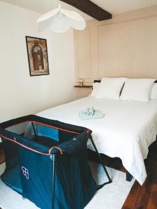 Postel nebo postele na pokoji v ubytování Appartement vue sur château-fort 3 étoiles