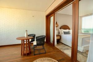 Posezení v ubytování Carlore Hotel Taíba + 26 fotografií