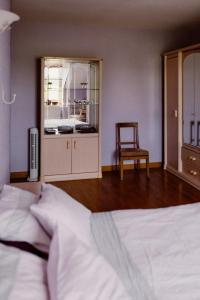 gîte la vannageoise客房内的一张或多张床位