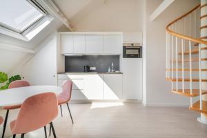 Η κουζίνα ή μικρή κουζίνα στο The Fashion Street Apartments +15 φωτογραφίες