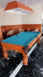 a pool table in the middle of a room at Iberotel Luxor in Luxor
