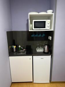 Kuchyňa alebo kuchynka v ubytovaní Klauzal19 Rooms