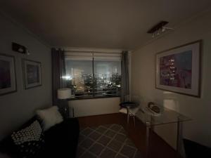 Χώρος καθιστικού στο Depto Las Condes