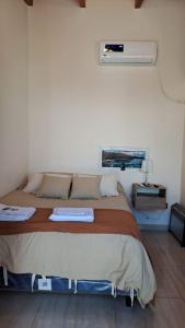 Ein Bett oder Betten in einem Zimmer der Unterkunft Rincón con Encanto