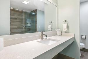 Vannituba majutusasutuses Cherry Tree Inn & Suites