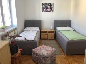Un pat sau paturi într-o cameră la Apartmán v Týně nad Vltavou