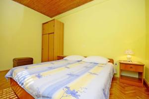 Postel nebo postele na pokoji v ubytování Apartments Marinko