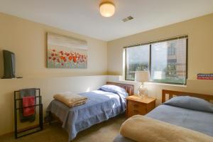 a bedroom with two beds and a window at 8 Mi to Copper Mountain Frisco Vacation Rental in Frisco +35 photos