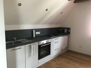 Η κουζίνα ή μικρή κουζίνα στο Ferienwohnung im Berghüttenstyle +6 φωτογραφίες