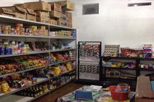 a store with a lot of food on the shelves at King Henry's Transient House in Bantay