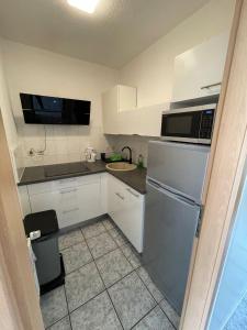 Köök või kööginurk majutusasutuses Wohnung in Möser mit Grillmöglichkeit