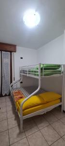Poschodová posteľ alebo postele v izbe v ubytovaní La casa Ciarlasca