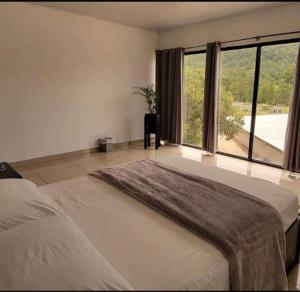 Postel nebo postele na pokoji v ubytování Diesbu Hotel