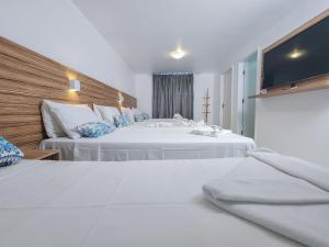 Postel nebo postele na pokoji v ubytování Hotel Refugio