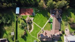 an aerial view of a house in a yard at Villa Rose & SPA in Mežciems