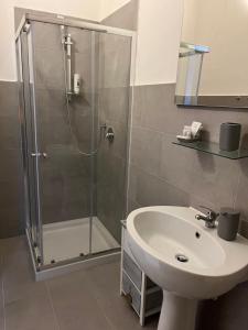 a bathroom with a shower and a sink at affittacamere san pietro resort in Rome