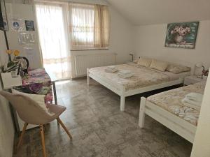 Ein Bett oder Betten in einem Zimmer der Unterkunft Rooms Sapina