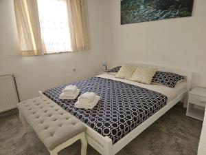 Ein Bett oder Betten in einem Zimmer der Unterkunft Rooms Sapina