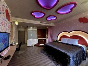 Postel nebo postele na pokoji v ubytování King & Princess Motel - Rende + 32 fotografií