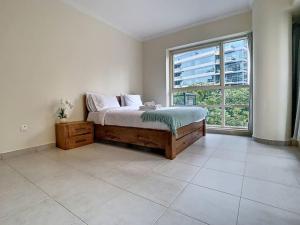 Postel nebo postele na pokoji v ubytování Key View - Marina Quays North