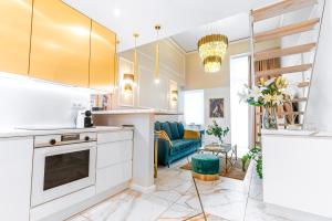 Kuchyňa alebo kuchynka v ubytovaní Apartament Chanel Jana Pawła