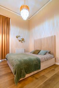 Posteľ alebo postele v izbe v ubytovaní Apartament Chanel Jana Pawła